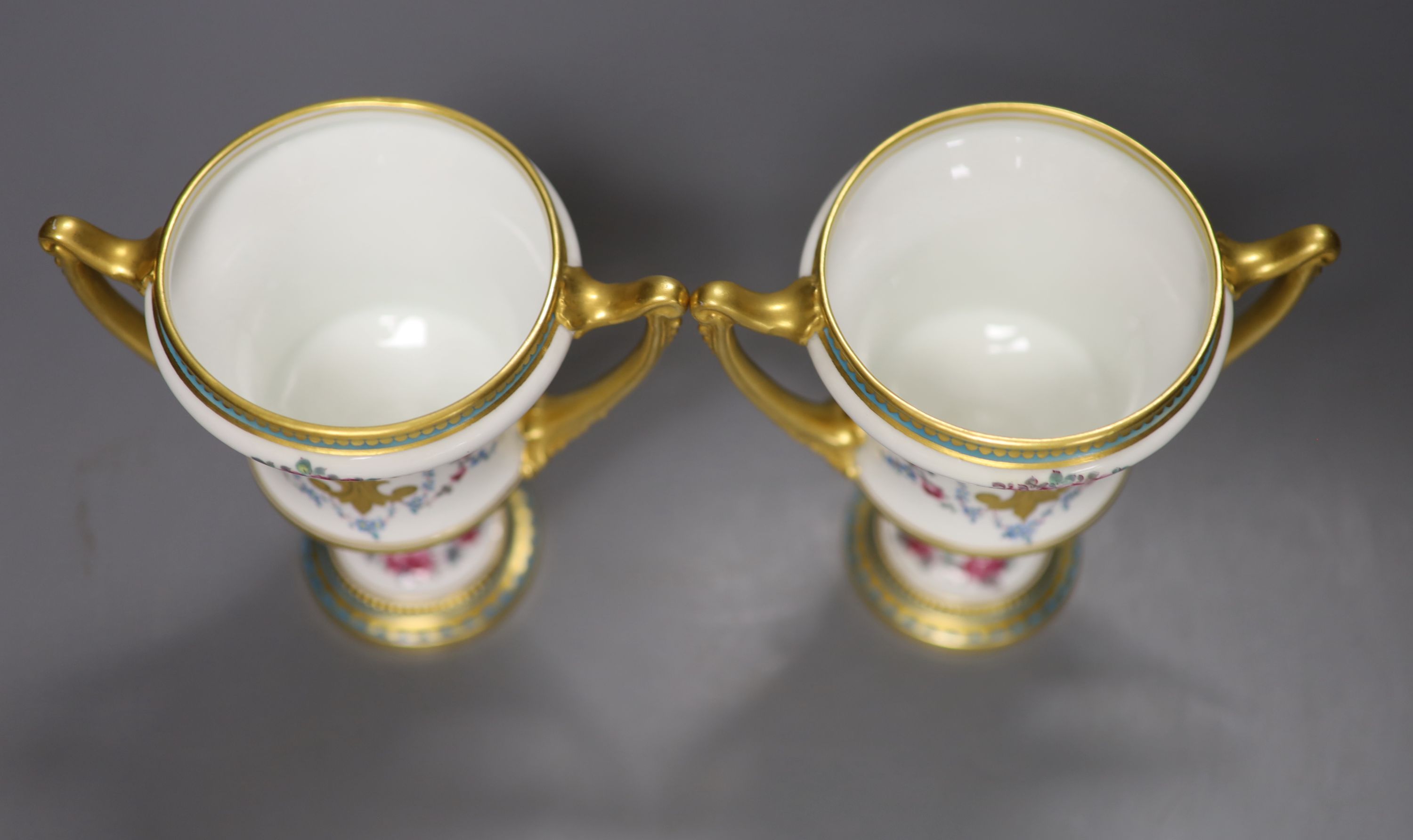 A pair of Royal Crown Derby two-handled campana-shaped urns, height 13cm